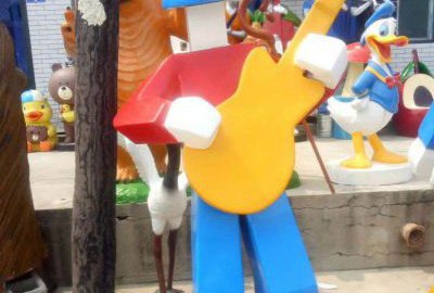 玻璃鋼塊面抽象彈琴人物雕塑